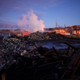 The remains of a senior center set ablaze during unrest in Baltimore smolder at dawn April 28, 2015. The unrest came hours after the funeral April 27, 2015, for Freddie Gray, the unarmed 25-year-old man who died while in police custody.
Mark Makela/Getty Images